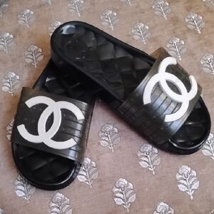 Authentic Chanel Women's Black and White Logo Slides